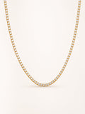 Classic white CZ tennis necklace in 18K gold plated stainless steel with a continuous row of brilliant round stones.